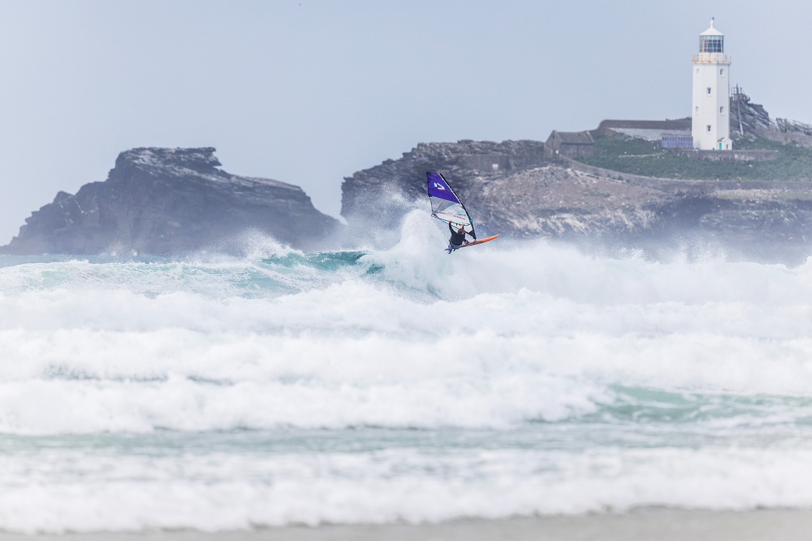 Windsurfing at Godrevy, Cornwall, with the lighthouse in the background